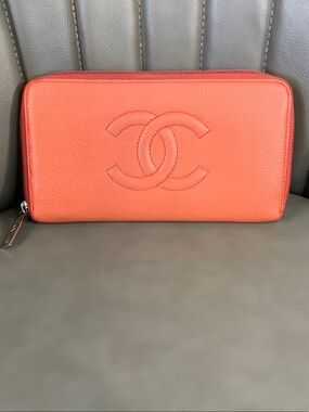 CHANEL Coral Zip-Around CC Embossed Leather Wallet